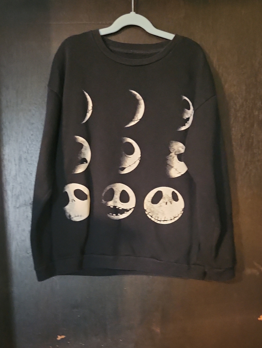 Disney Black Crewneck with White Moon Phase Jack Skellington Faces